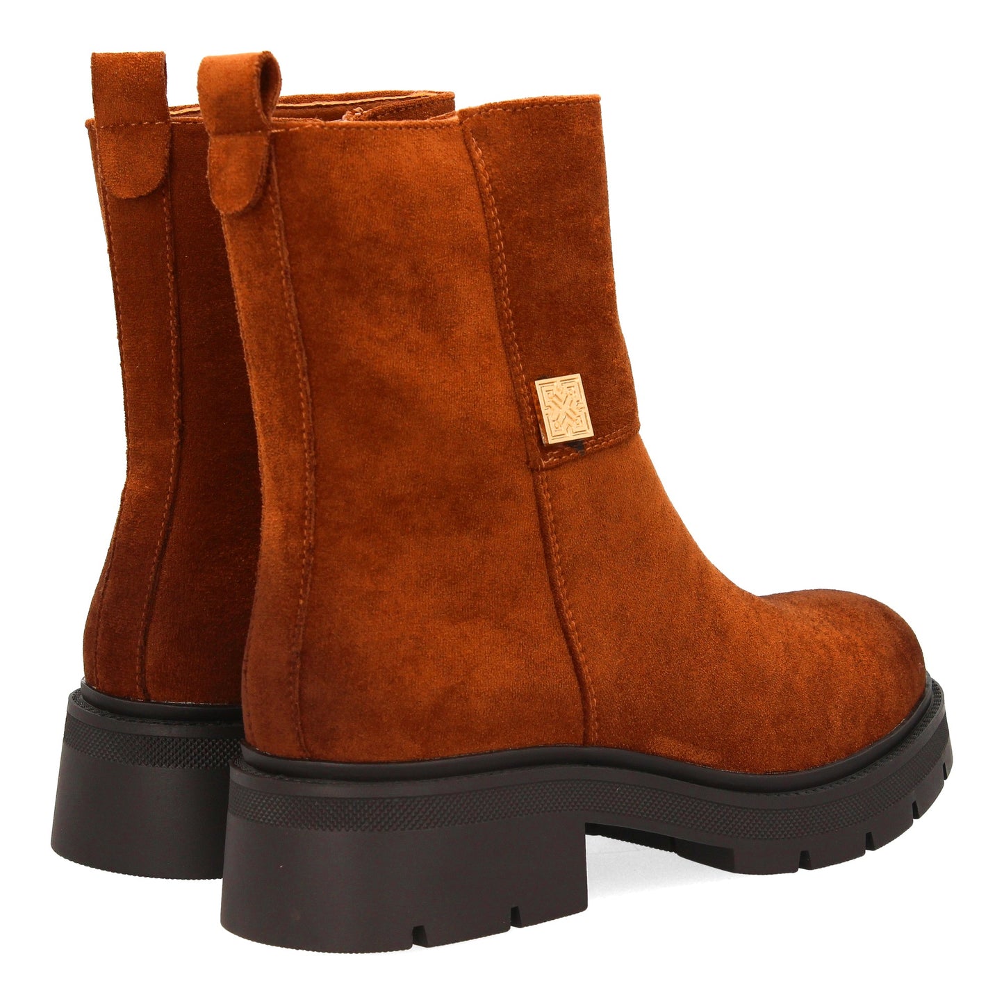 Botín moderno con estampado liso.Incorpora un adorno metálico lateral. Suel