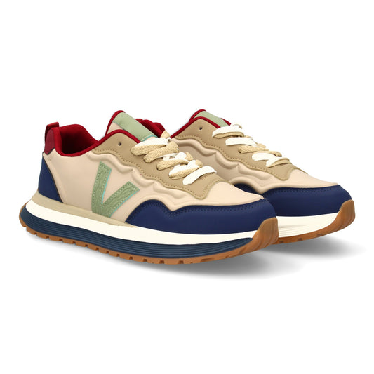 Zapatilla deportiva con Diseño moderno y suela dentada. Detalles de contraste  c