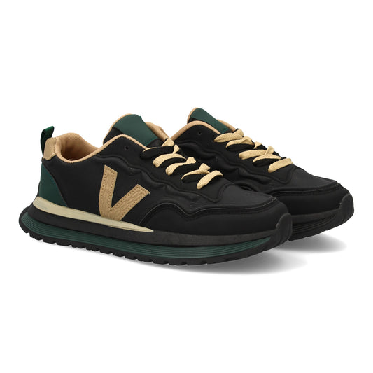 Zapatilla deportiva con Diseño moderno y suela dentada. Detalles de contraste  c