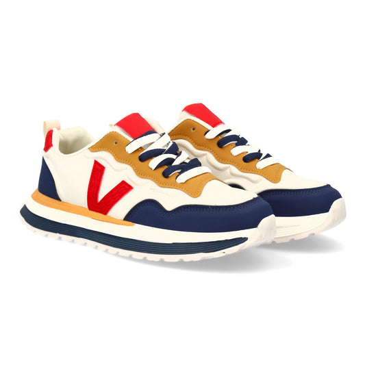 Zapatilla deportiva con Diseño moderno y suela dentada. Detalles de contraste  c