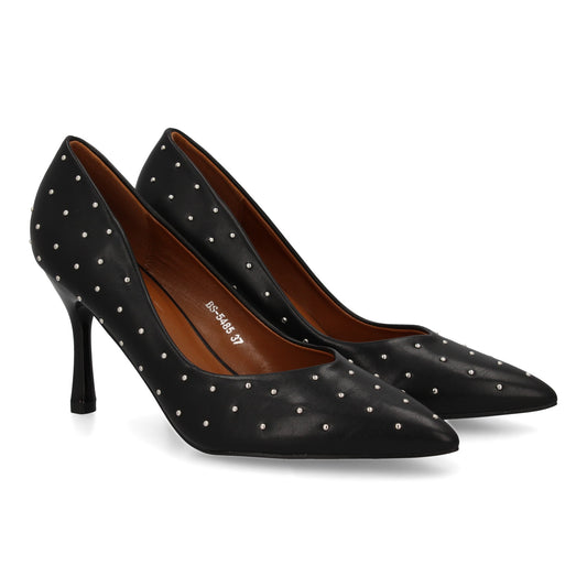 Zapato de salón para mujer con tacón fino y alto. Estampado liso sin cierre. Con