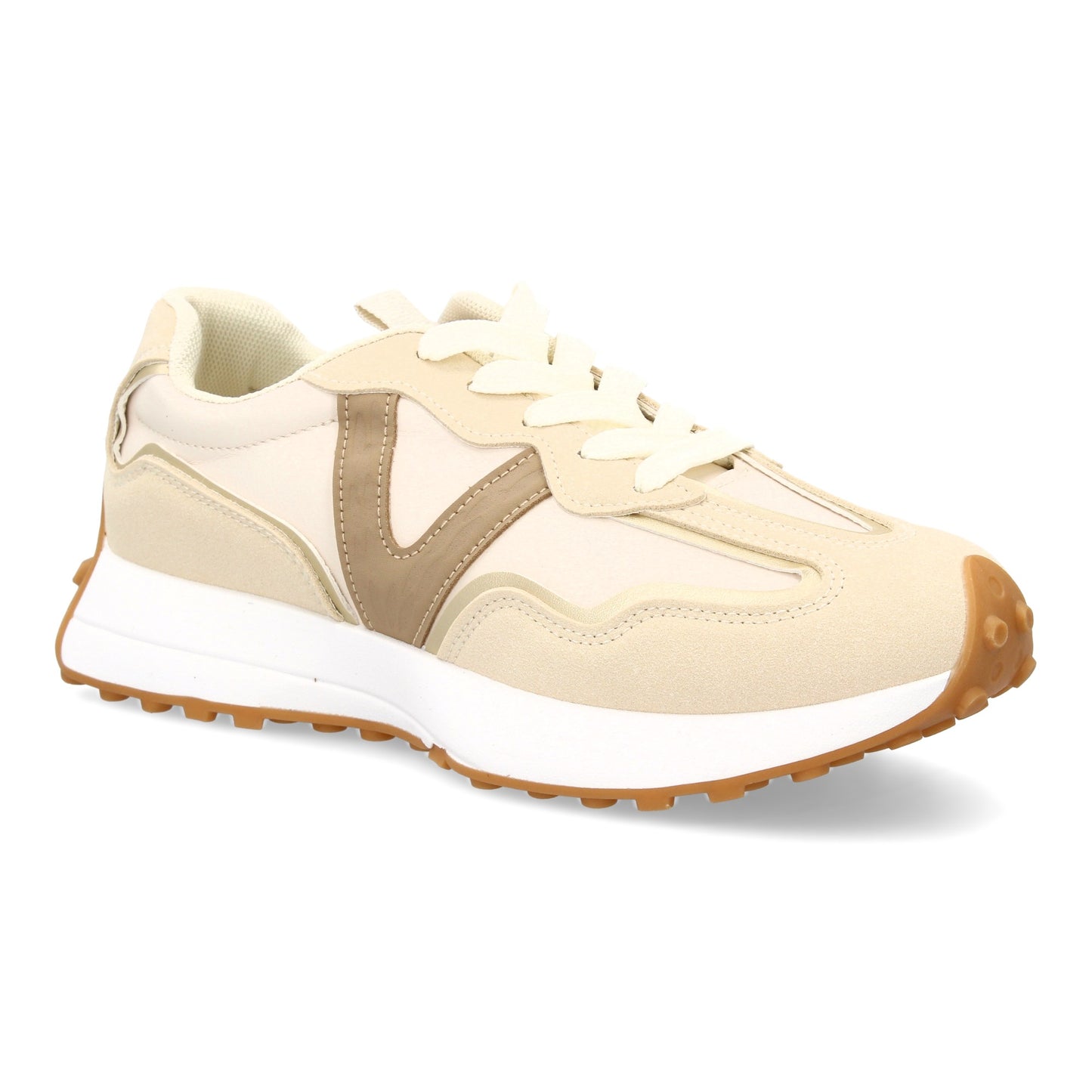 Zapatilla deportiva con Diseño moderno y suela dentada. Detalles de contraste c