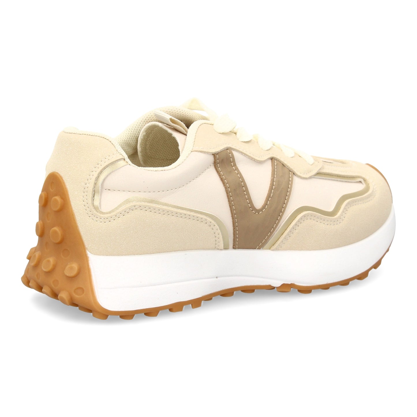 Zapatilla deportiva con Diseño moderno y suela dentada. Detalles de contraste c