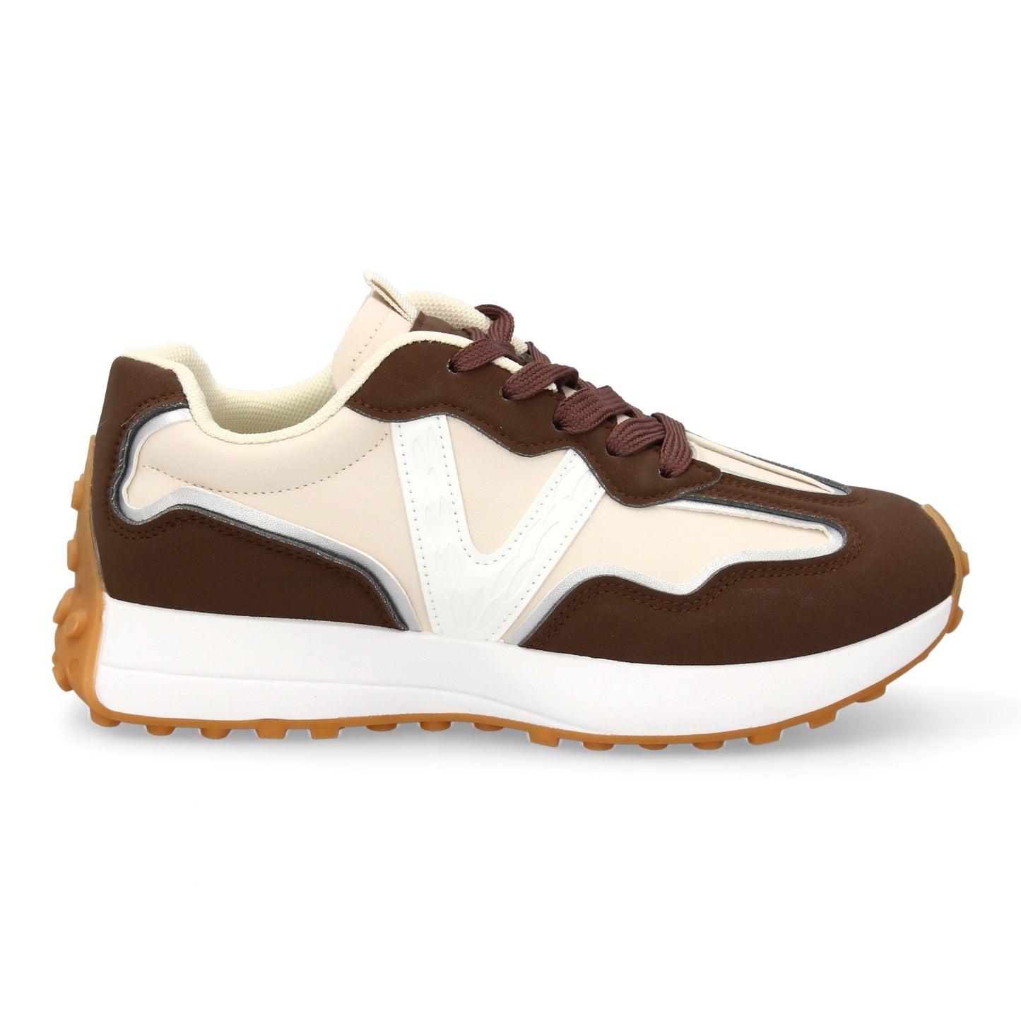 Zapatilla deportiva con Diseño moderno y suela dentada. Detalles de contraste c