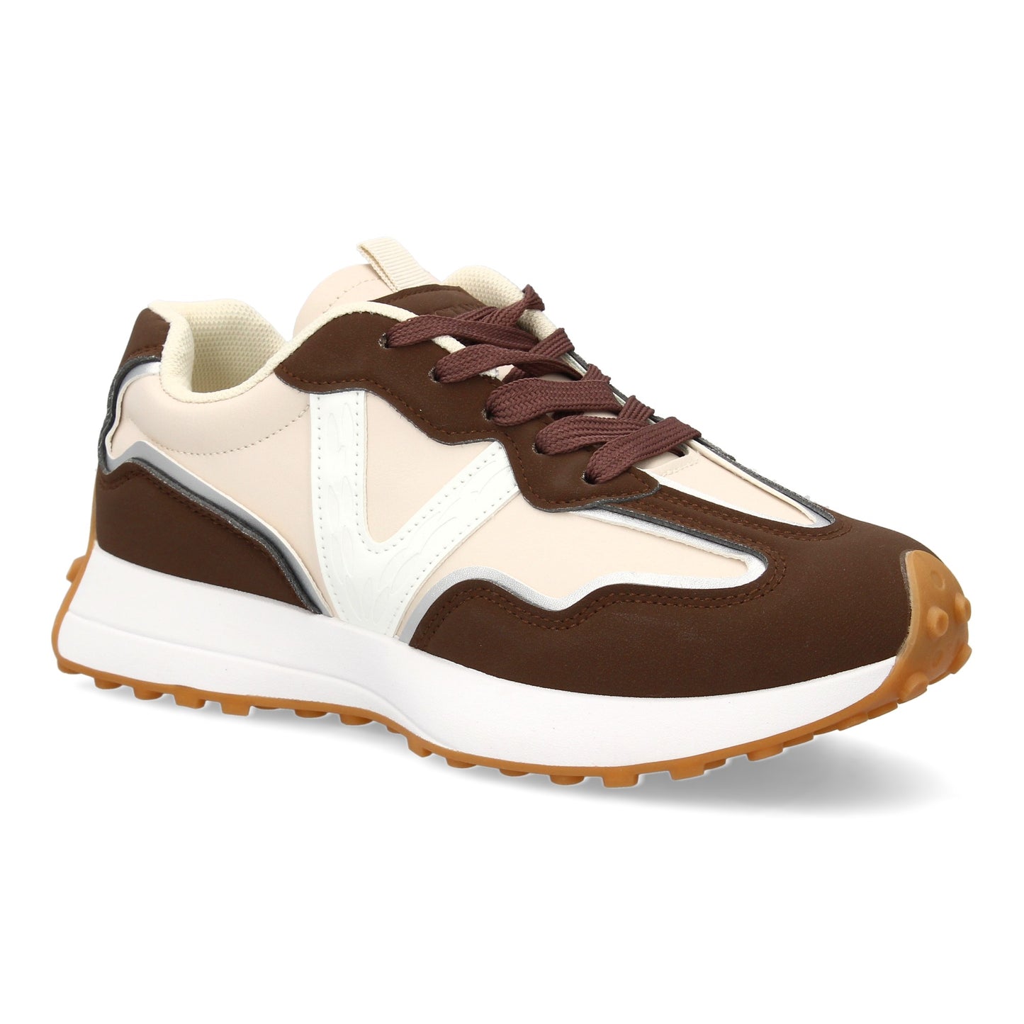 Zapatilla deportiva con Diseño moderno y suela dentada. Detalles de contraste c