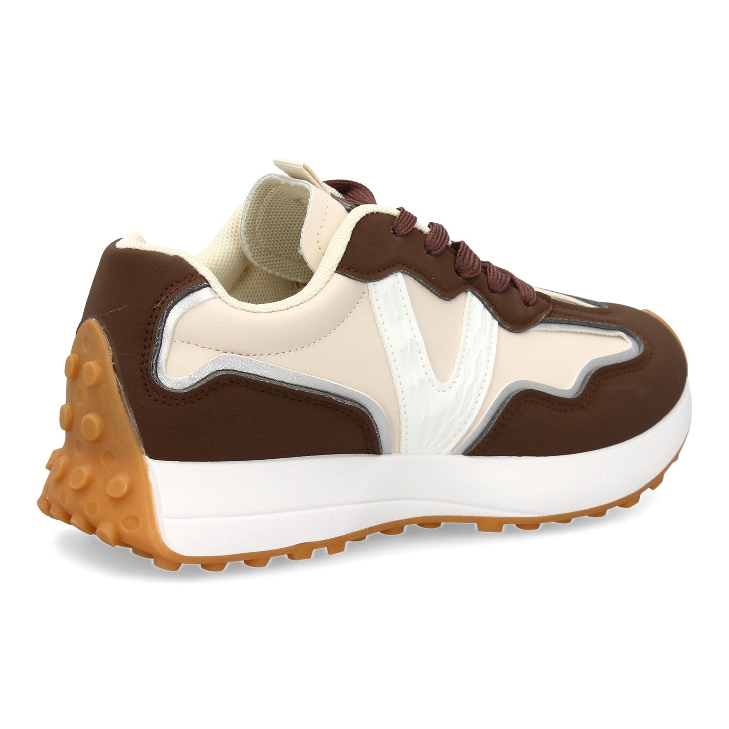 Zapatilla deportiva con Diseño moderno y suela dentada. Detalles de contraste c