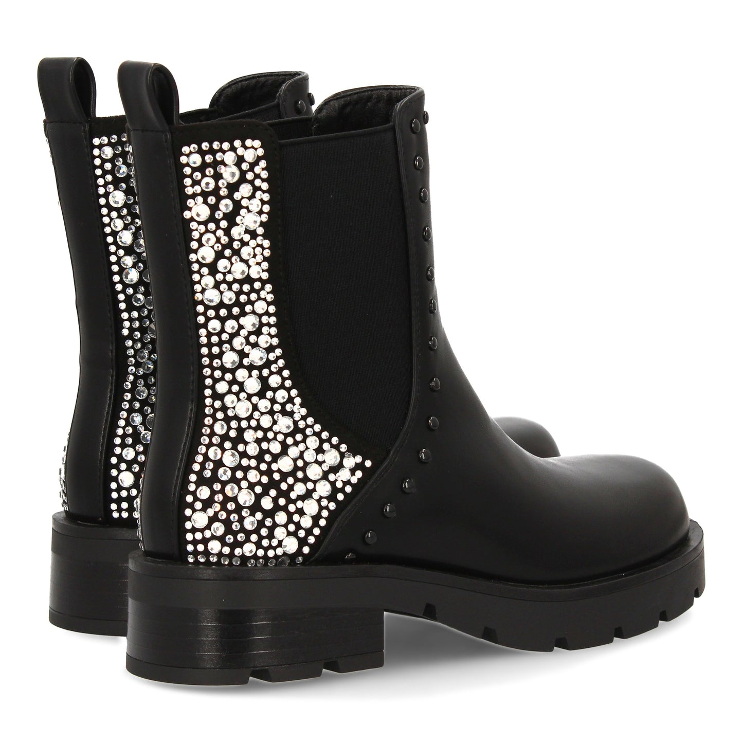 Botín chelsea con estampado liso. Tachulelas brillantes en e