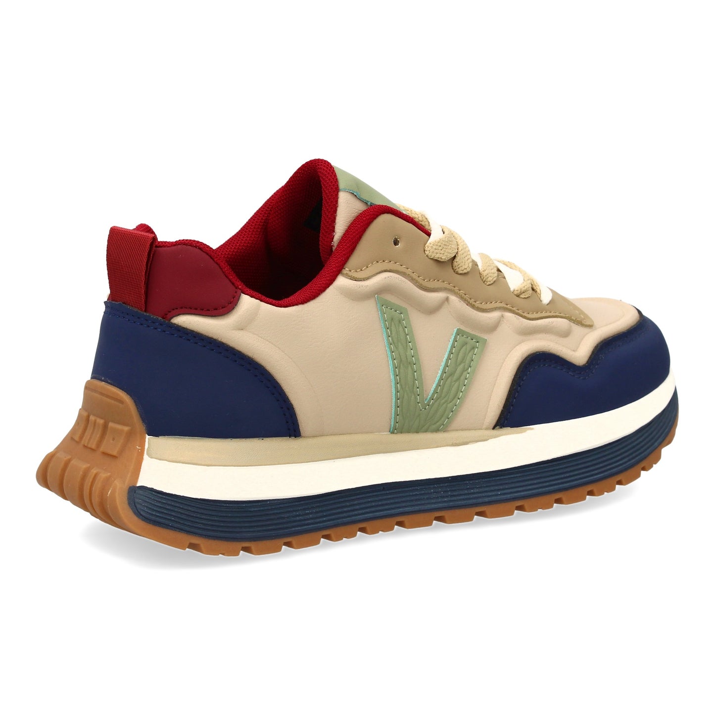 Zapatilla deportiva con Diseño moderno y suela dentada. Detalles de contraste  c