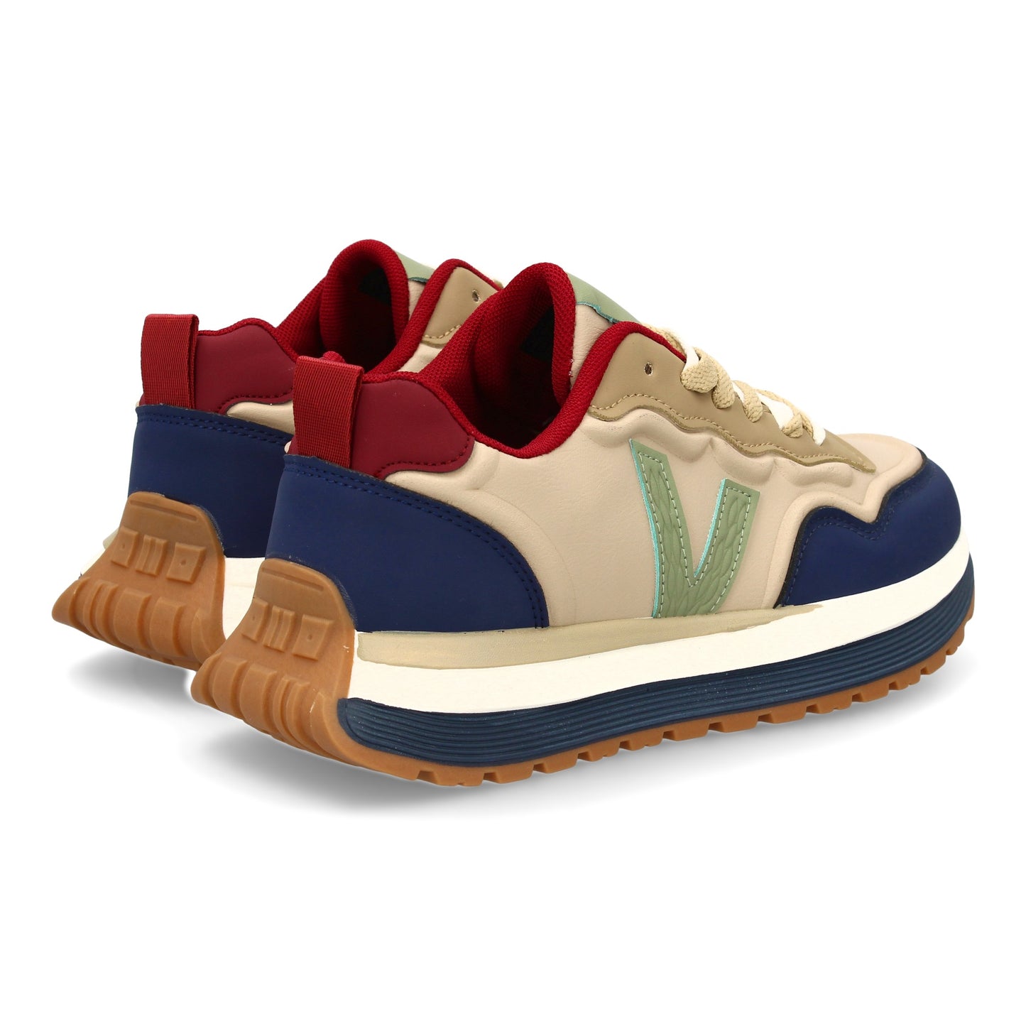 Zapatilla deportiva con Diseño moderno y suela dentada. Detalles de contraste  c