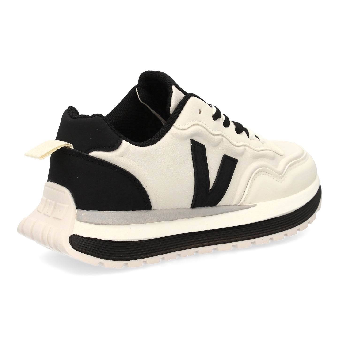 Zapatilla deportiva con Diseño moderno y suela dentada. Detalles de contraste  c