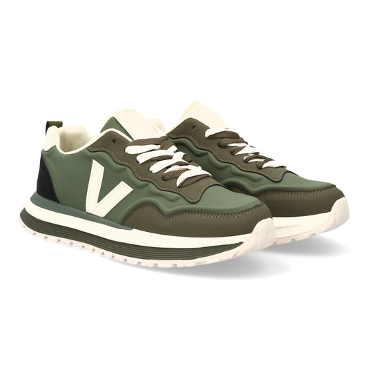 Zapatilla deportiva con Diseño moderno y suela dentada. Detalles de contraste  c