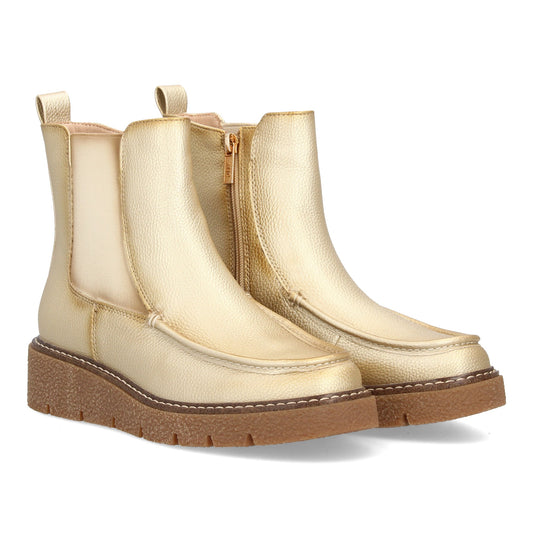 Bota tipo Chelsea con cuña para mujer con diseño minimalista. Incorpora pan