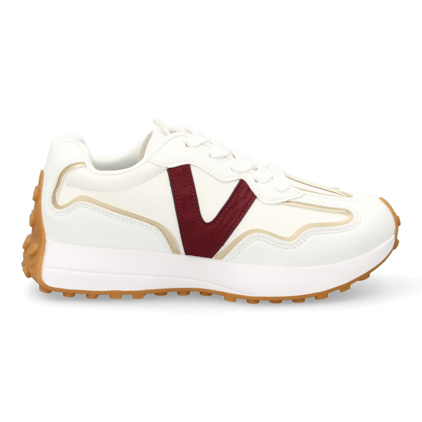 Zapatilla deportiva con Diseño moderno y suela dentada. Detalles de contraste  c