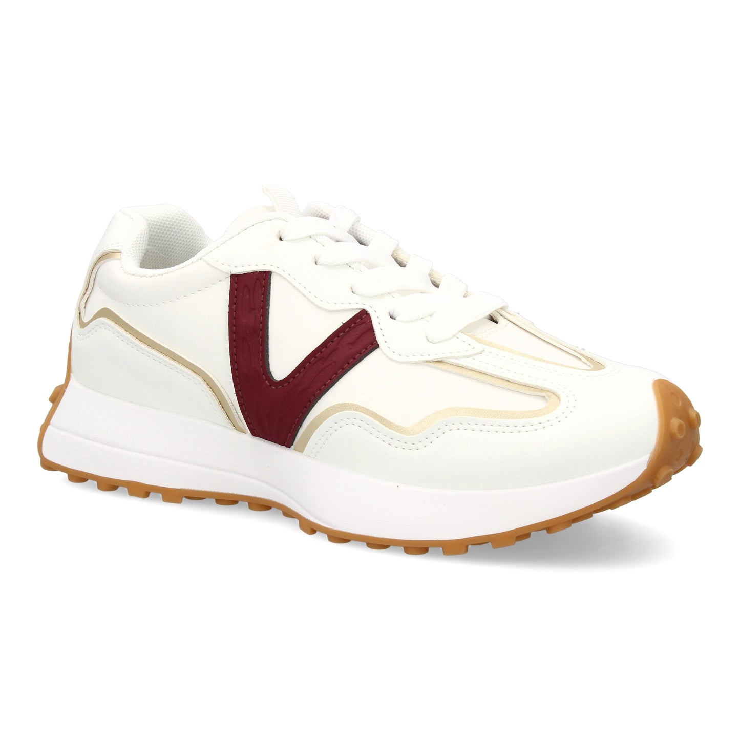 Zapatilla deportiva con Diseño moderno y suela dentada. Detalles de contraste  c
