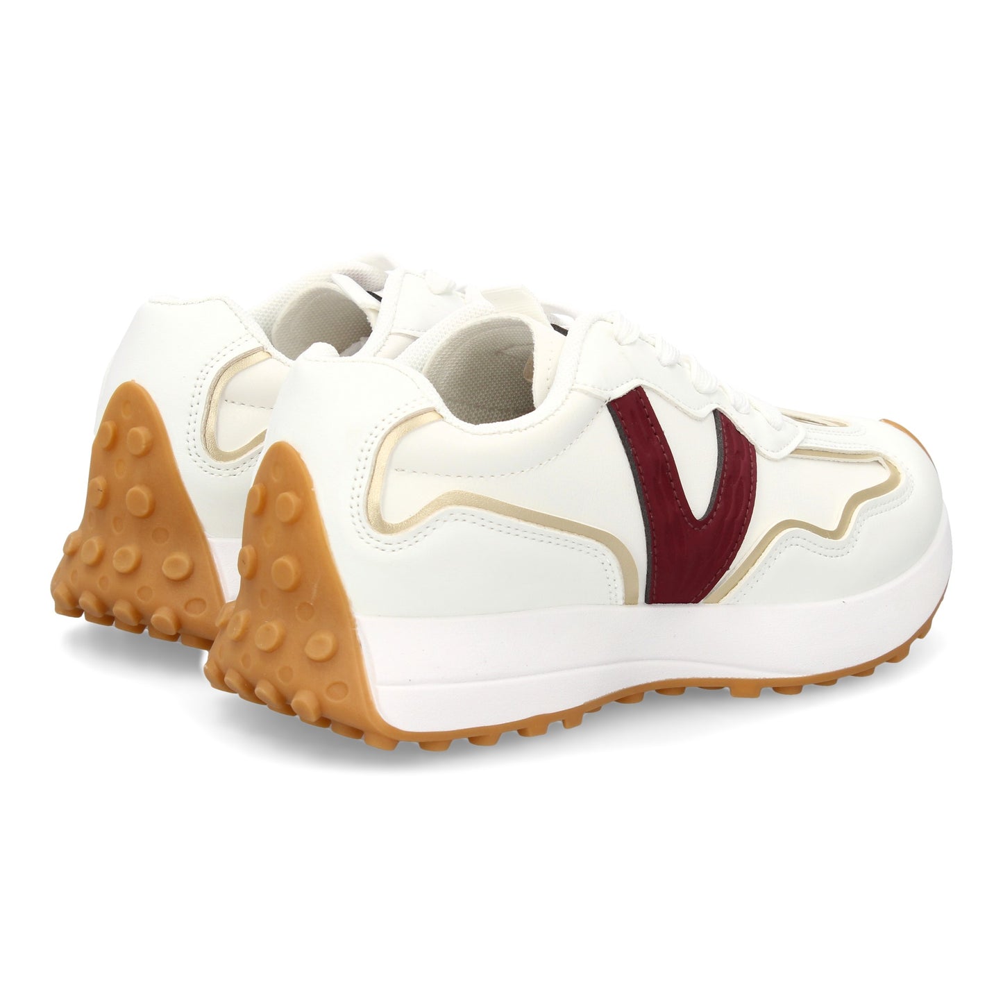 Zapatilla deportiva con Diseño moderno y suela dentada. Detalles de contraste  c