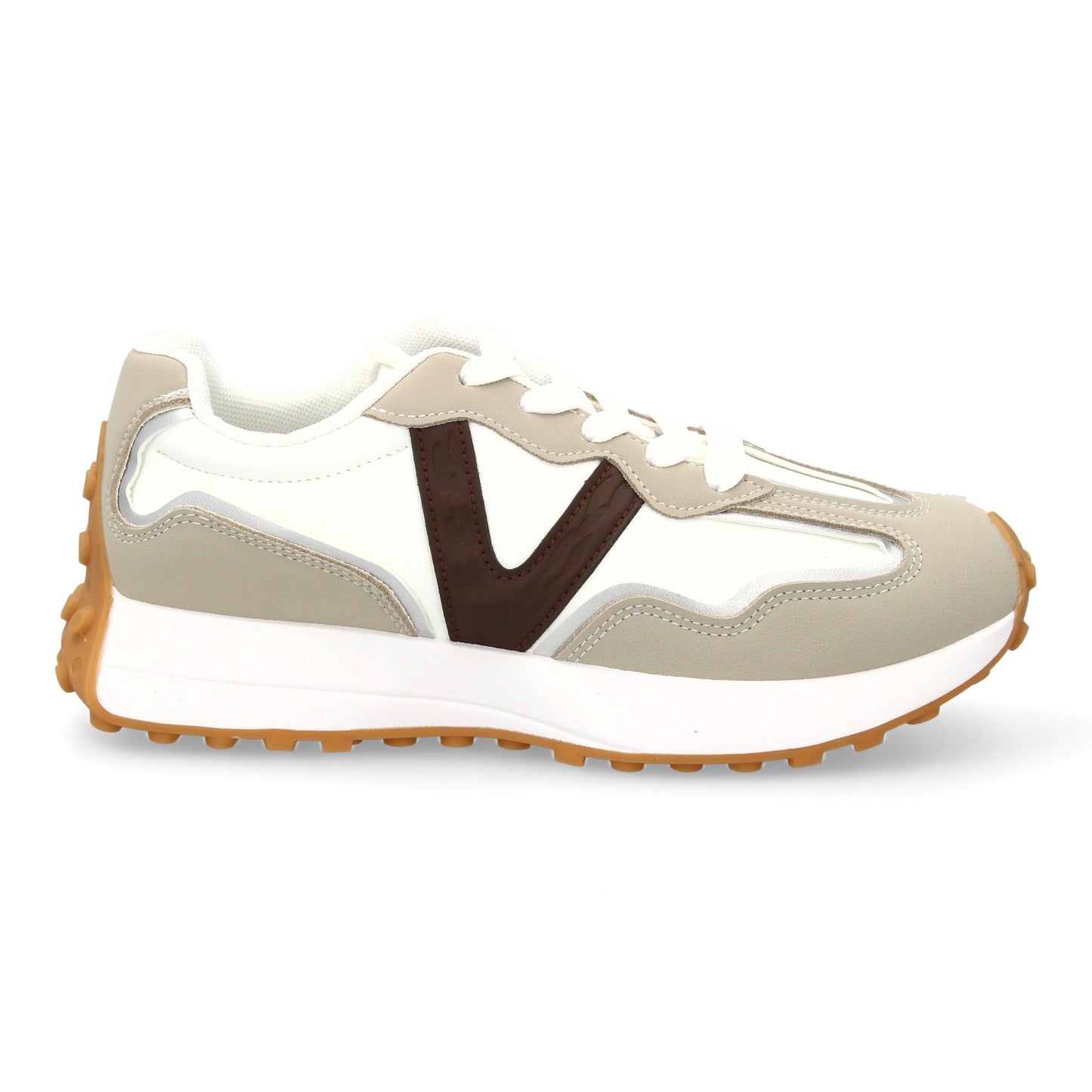 Zapatilla deportiva con Diseño moderno y suela dentada. Detalles de contraste  c