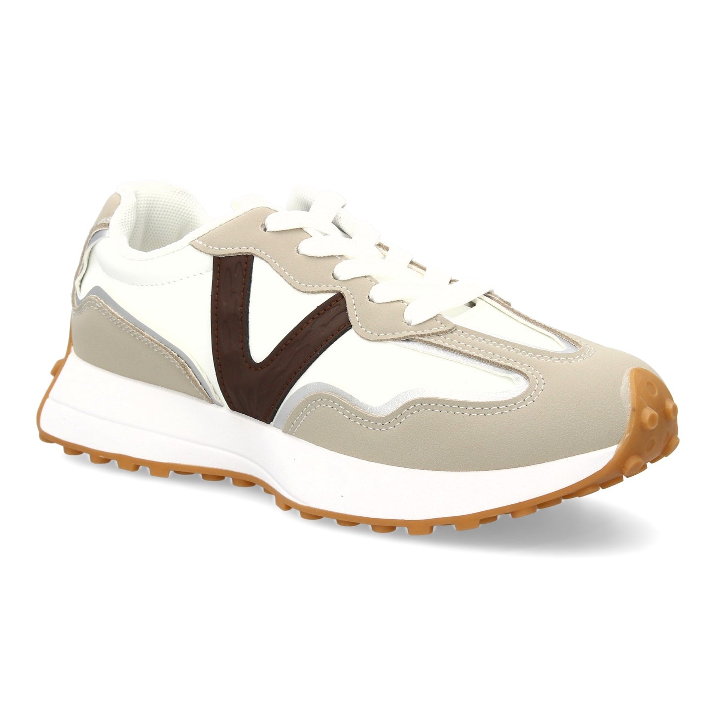 Zapatilla deportiva con Diseño moderno y suela dentada. Detalles de contraste  c