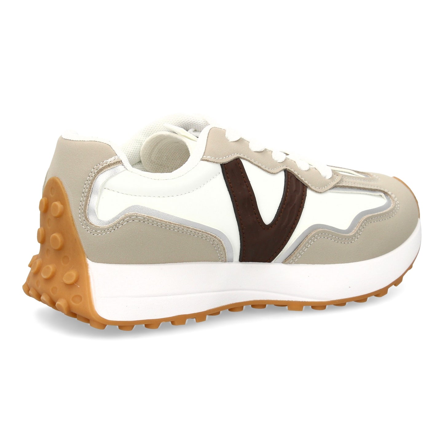 Zapatilla deportiva con Diseño moderno y suela dentada. Detalles de contraste  c