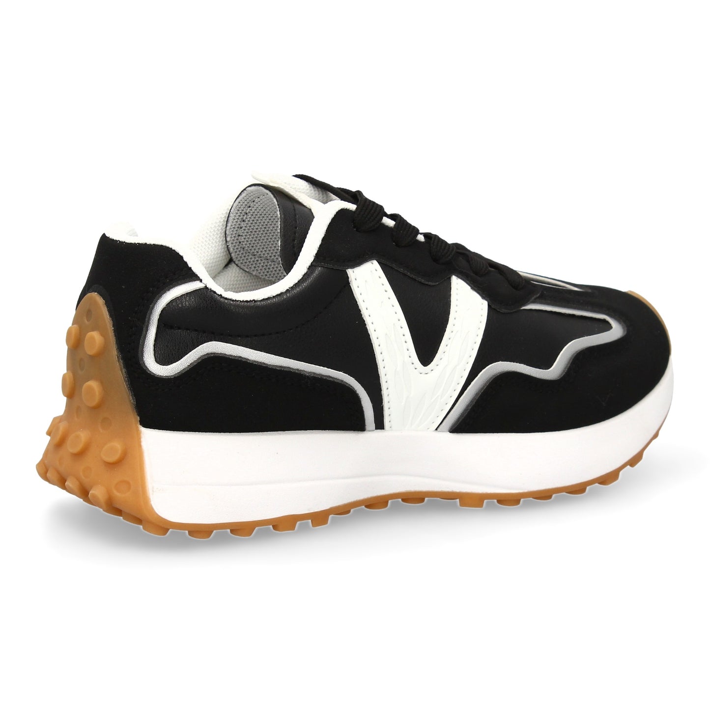 Zapatilla deportiva con Diseño moderno y suela dentada. Detalles de contraste  c