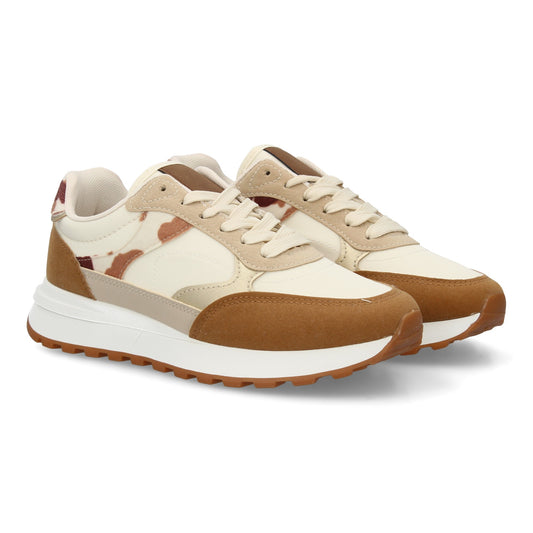 Zapatilla deportiva para mujer de estilo casual combina materiales y textur